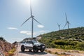 Custom made pickup truck with wind farm in background