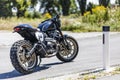 Custom made scrambler style cafe racer standing on road Royalty Free Stock Photo