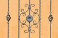 Custom made vintage retro grey wrought iron fence with various small to large handmade decorations in shape of flowers and other