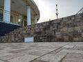 A custom sign board placed on the exterior staircase of the building. Royalty Free Stock Photo