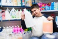 Customer buying detergents for laundry