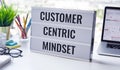 Customer centric mindset text with work table.business service Royalty Free Stock Photo