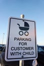 Customer with child parking