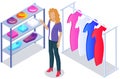 Customer choosing clothes in store. Shop assistant helps buyer to choose product during shopping