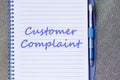 Customer complaint write on notebook