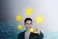 Customer Experience Concept. Young Businessman with Happy Face Showing his Five Star Services Rating Satisfaction Royalty Free Stock Photo