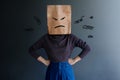 Customer Experience or Human Emotional Concept. Woman Covered her Face by Paper Bag and present Angry Feeling