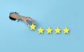 Customer Experience Woman hand vote on five star excellent rating on blue background. Review and feedback concept
