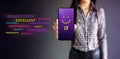 Customer Experiences Concept. Happy Female Client Giving Smiling Emoticon Rating, Positive Review via Smartphone. Client`s Royalty Free Stock Photo