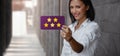 Customer Experiences Concept. Happy Young Business Woman Giving Five Stars Rating and Positive Review on Card Royalty Free Stock Photo