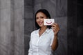 Customer Experiences Concept. Smiling Business Woman Feedback a Happy Emoticon on Card. Positive Review. Client Satisfaction