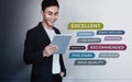 Customer Experiences Concept. a Young Happy Man Reading Positive Review Rating via Digital Tablet. Client`s Satisfaction Survey