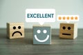 Customer Feedback Evaluation Wooden Blocks Displaying Excellent Rating and Satisfaction Level Assessment Royalty Free Stock Photo