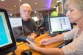 Customer getting cash out from bank cashier