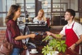 Customer handing a credit card to the waiter Royalty Free Stock Photo