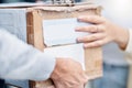 Customer hands, courier cardboard box and delivery man giving retail sales product, shopping or shipping container Royalty Free Stock Photo