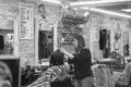 A Customer Having Her Hair Cut in a Salon.