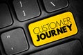 Customer Journey - visual representation of a customer\'s experience with a company, text button on keyboard