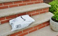 Customer Order Package Delivered to Home on Door Step