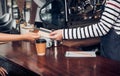 Customer pay coffee drink with credit card to barista,Close up h Royalty Free Stock Photo