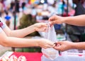 Customer paying bill by cash at market Royalty Free Stock Photo