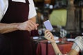 Customer paying with credit card at the restaurant Royalty Free Stock Photo