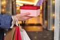 customer& x27;s hand holding shopping bag Royalty Free Stock Photo