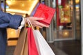 customer's hand holding shopping bag Royalty Free Stock Photo