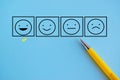 Customer satisfaction happy feedback rating checklist and excellent business quality evaluation concept with a checking smiling Royalty Free Stock Photo