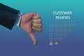 Customer satisfaction survey and questionnaire concept. Hand of client show bad sign with thumb down. Royalty Free Stock Photo