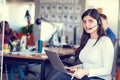 Customer Service agent in an startup office with laptop Royalty Free Stock Photo