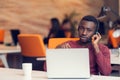 Customer Service agent in an startup office with laptop Royalty Free Stock Photo