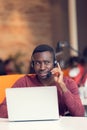 Customer Service agent in an startup office with laptop Royalty Free Stock Photo