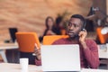 Customer Service agent in an startup office with laptop Royalty Free Stock Photo