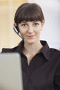Customer Service Operator Wearing Telephone Headset Royalty Free Stock Photo
