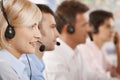 Customer service operators in a row Royalty Free Stock Photo