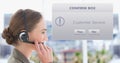 Customer service representative using headset by dialog box