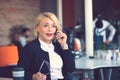 Customer service representative at work. Beautiful young woman in headset working at the computer Royalty Free Stock Photo