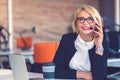 Customer service representative at work. Beautiful young woman in headset working at the computer Royalty Free Stock Photo