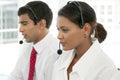 Customer service representatives at work in multiethnic call center Royalty Free Stock Photo