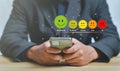 Customer service and Satisfaction concept,Businessman pressing smiley face emoticon on virtual touch screen,happy Smiley face icon Royalty Free Stock Photo