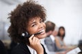 Customer service with a smile. Portrait of an attractive young female call center operator. Royalty Free Stock Photo