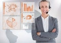 Customer service woman with world map interface in background Royalty Free Stock Photo