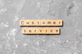 Customer service word written on wood block. customer service text on cement table for your desing, concept Royalty Free Stock Photo