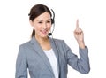 Customer services officer with finger point up Royalty Free Stock Photo