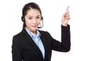 Customer services operator with finger point up Royalty Free Stock Photo