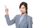 Customer services operator and finger point up Royalty Free Stock Photo