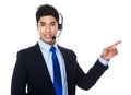 Customer services representative with finger point up Royalty Free Stock Photo