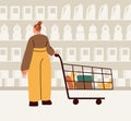 Customer in supermarket. Woman consumer shopping in hypermarket. Female character standing with cart, trolley, choosing Royalty Free Stock Photo