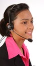 Customer support by beautiful female on telephone Royalty Free Stock Photo